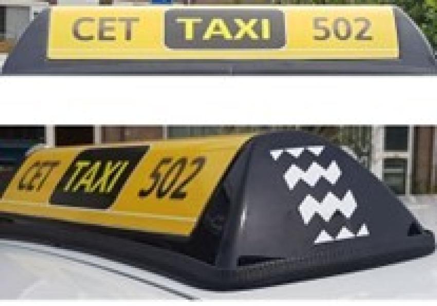 Op deze afbeelding staan de taxibordjes van Coop. Eindhovense Taxidiensten weergegeven, klik voor een vergroting