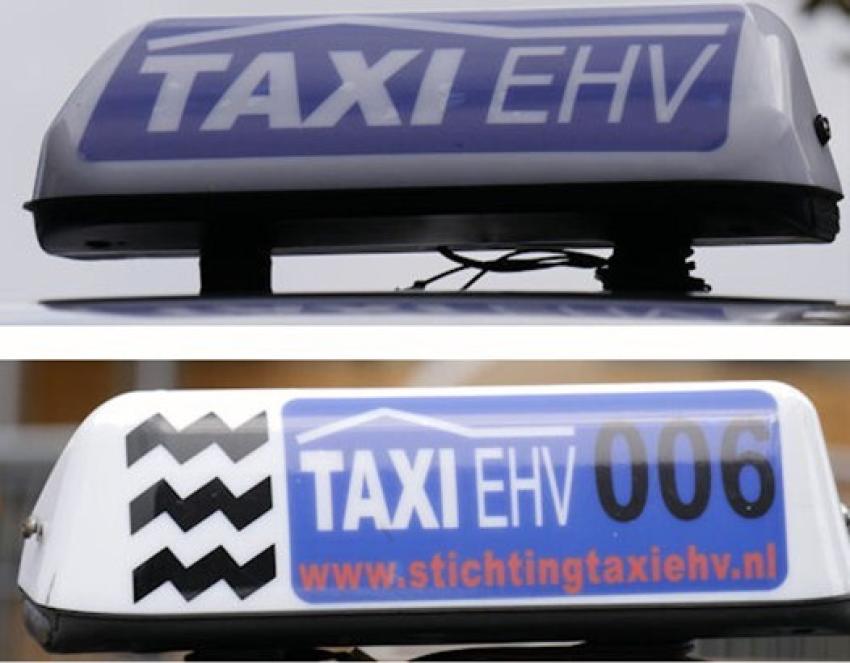Op deze afbeelding zie je de bordjes van Stichting Taxi Eindhoven, klik voor een vergroting